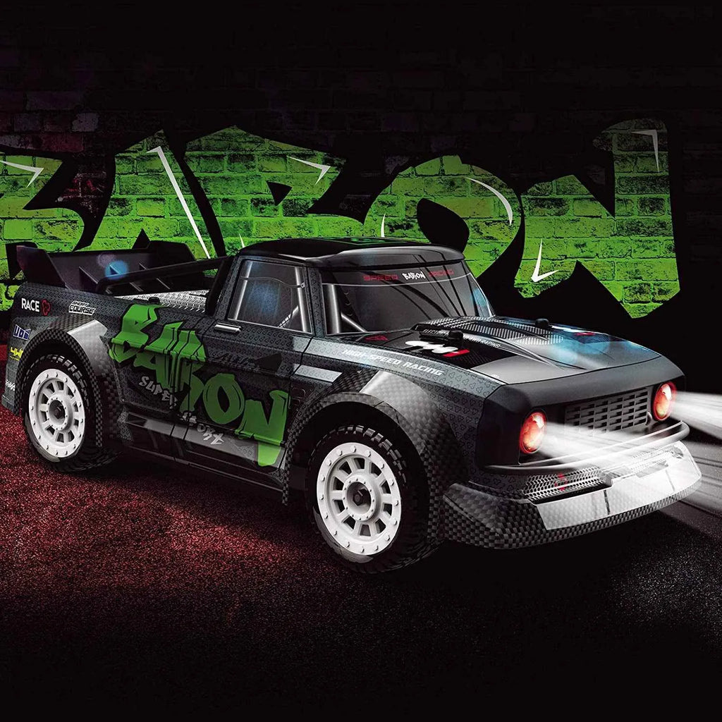 Black and green rc drift truck with 'Carbon' branding on a dark background