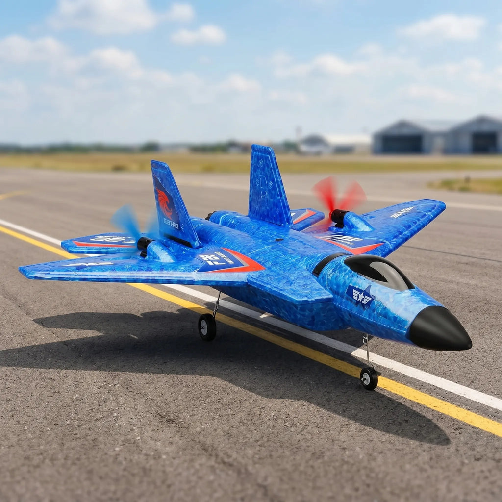 Blue RC F-22 airplane on a runway with a clear sky background