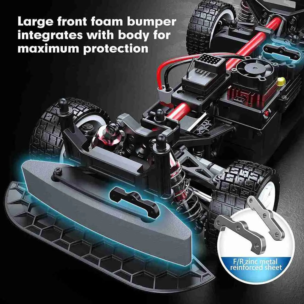 Close-up of a model car chassis with a large front foam bumper for maximum protection, on a dark background.