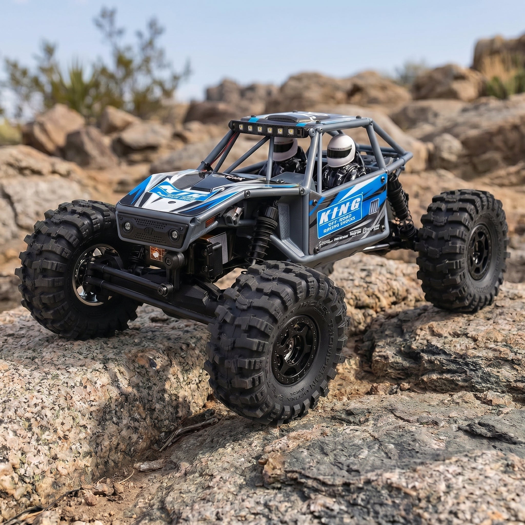 Axial UTB18 Capra 1/18 Scale 4WD RC Rock Crawler | 4-Wheel Steering Trail Buggy | Spektrum RTR | Yellow & Blue
