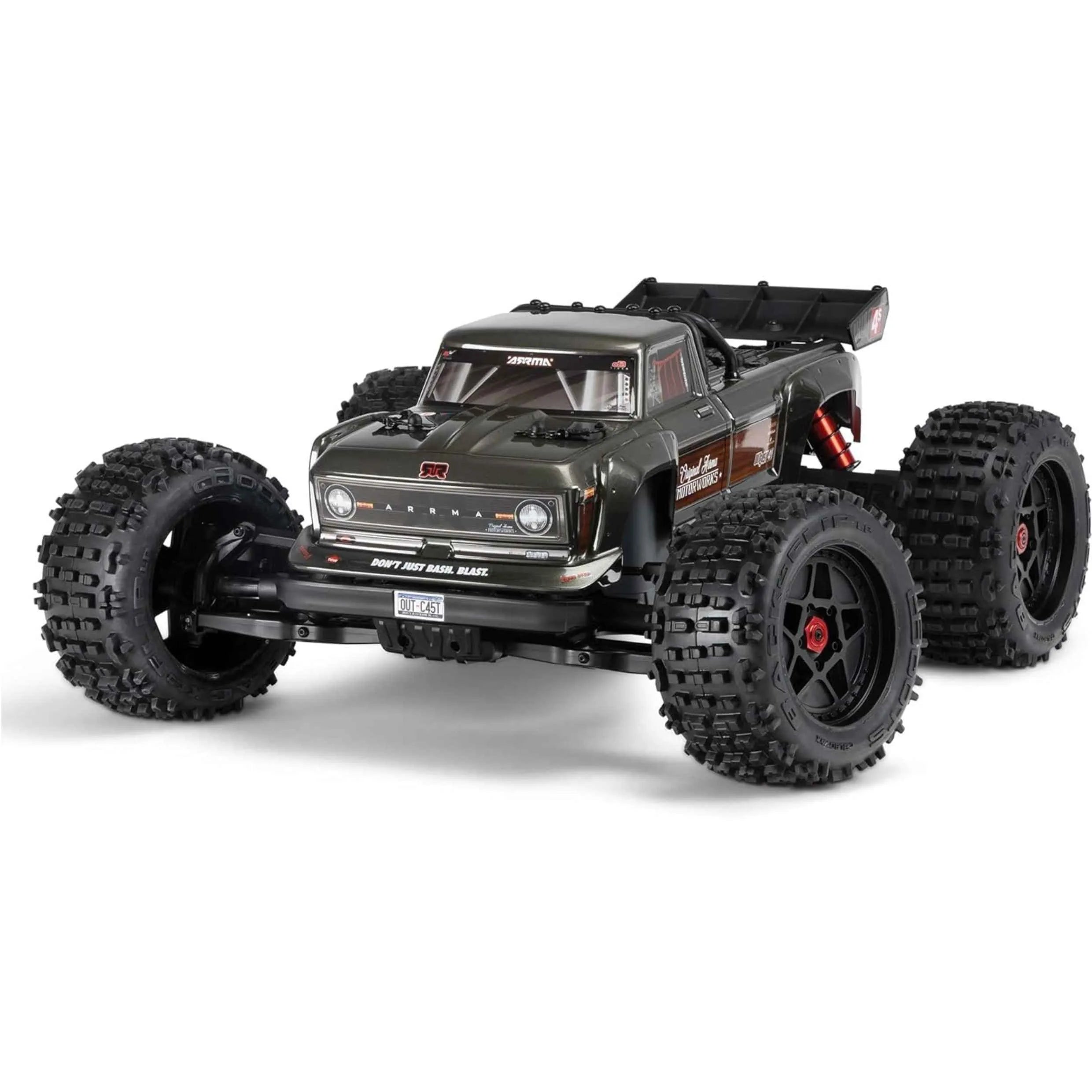 Rc monster truck with large tires on a white background