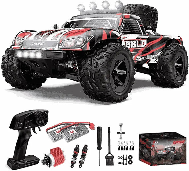 Remote control monster truck with accessories on a white background