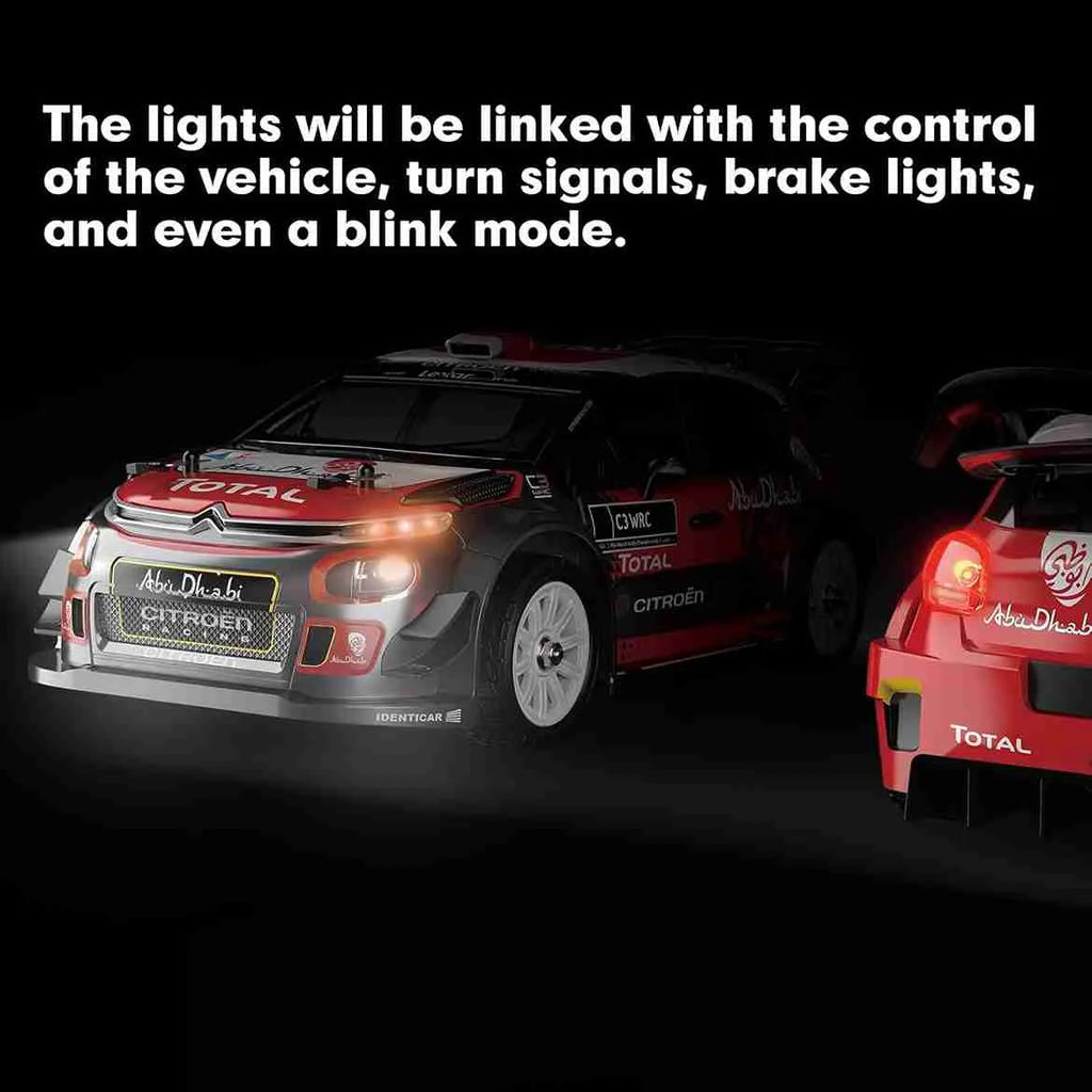 Two Citroen cars with illuminated lights on a black background