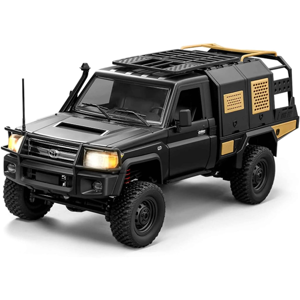 Black and gold RC crawler on a white background