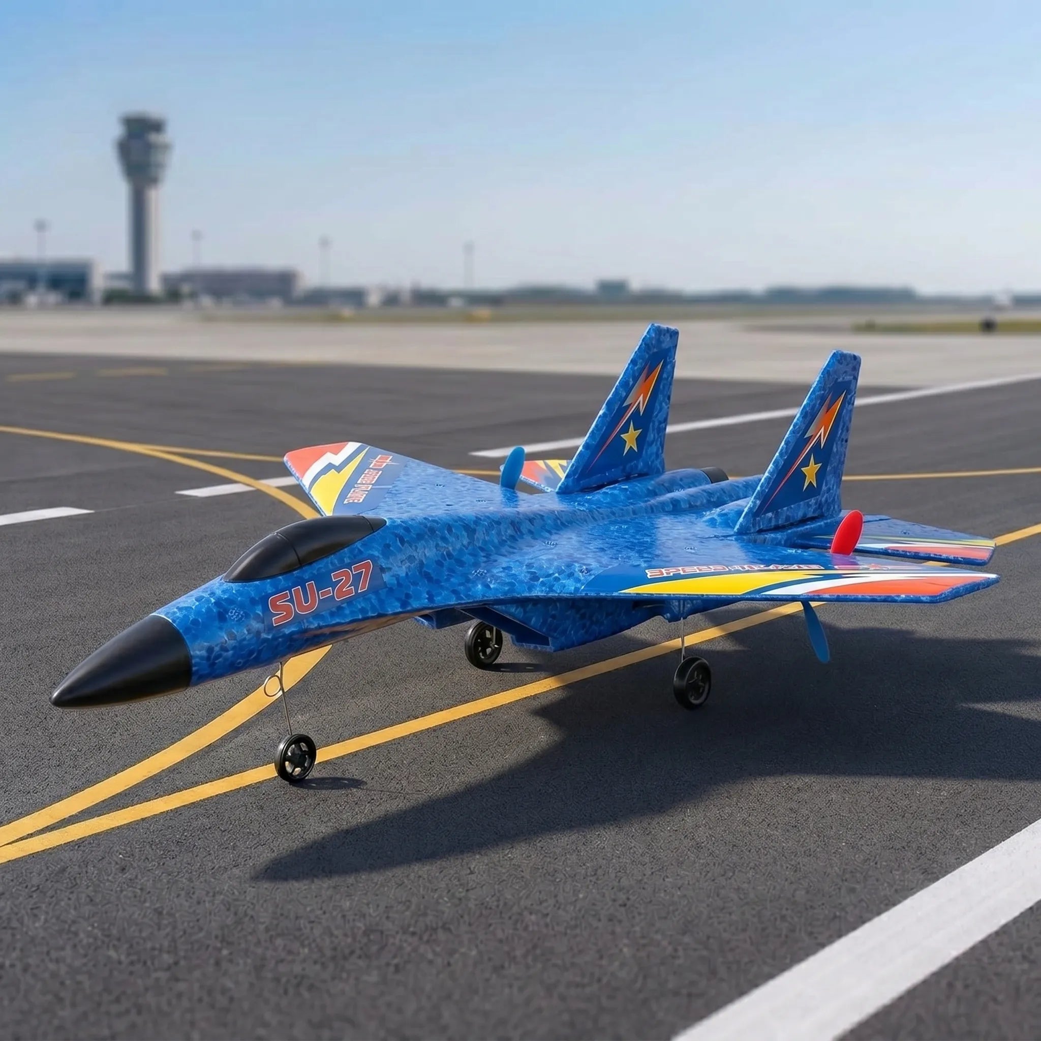 Blue model RC airplane with 'SU-27' marking on an airport runway