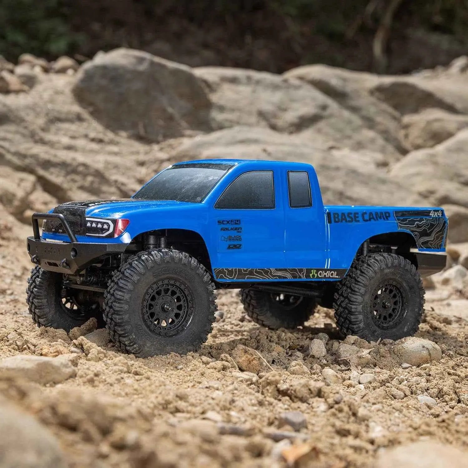 Blue off-road crawler on a rocky terrain