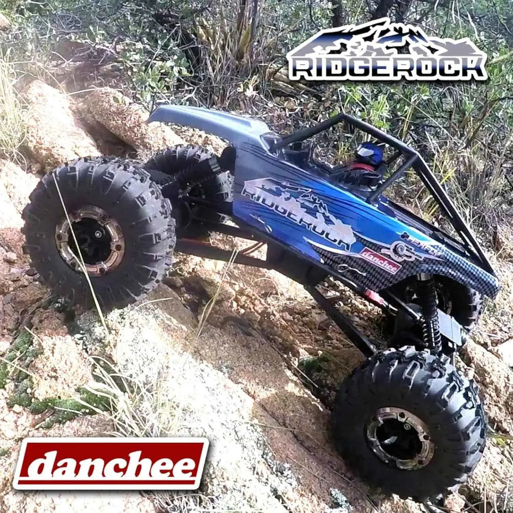 Blue off-road crawler climbing a rocky incline with 'Ridgerock' and 'Danchee' branding.