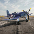 Blue RC corsair plane on runaway. 