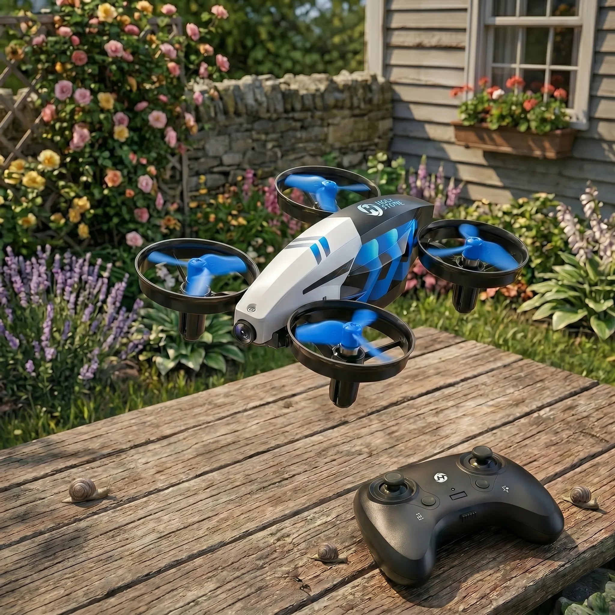 Blue RC Drone with blue accents on a wooden surface in a garden setting