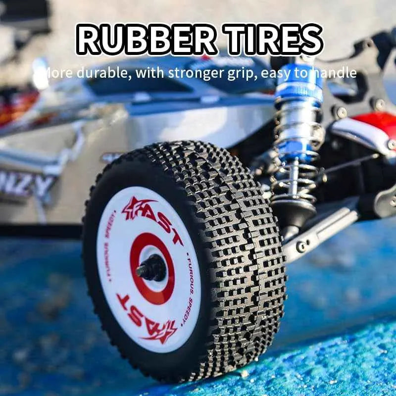 Close-up of a rubber tire with 'FAST' branding on a blurred background