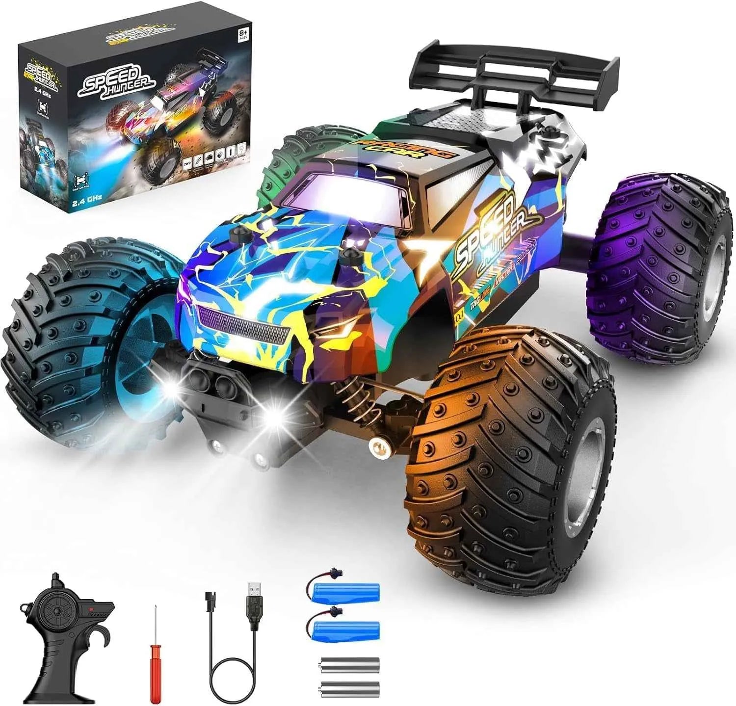 Colorful remote control monster truck with accessories on a white background