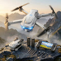 Grey RC Drone with accessories on a rocky surface with a mountainous background