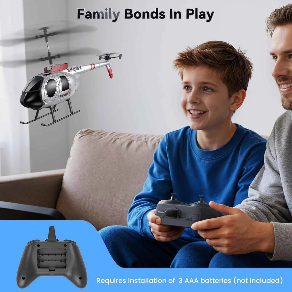 Man and child playing with a remote control helicopter indoors.