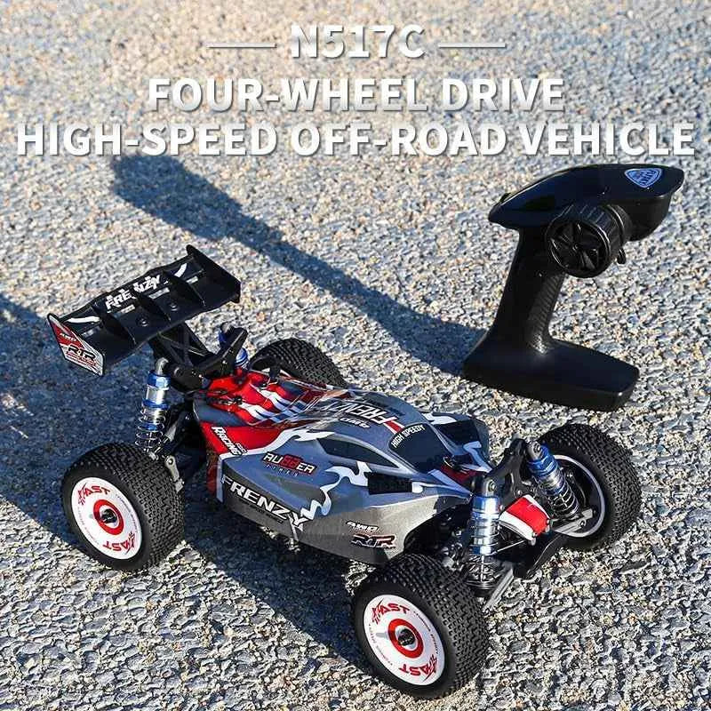 Model of a four-wheel drive high-speed off-road buggy  with remote control on a textured surface.