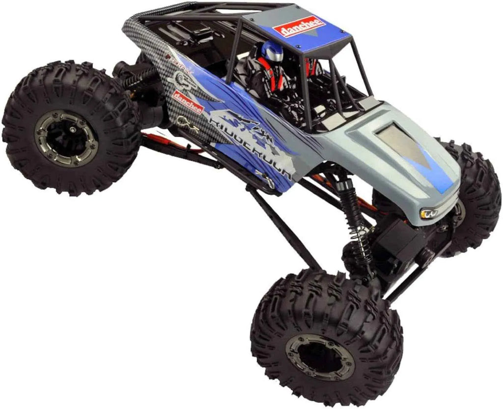 Model of a RC crawler with large wheels on a white background