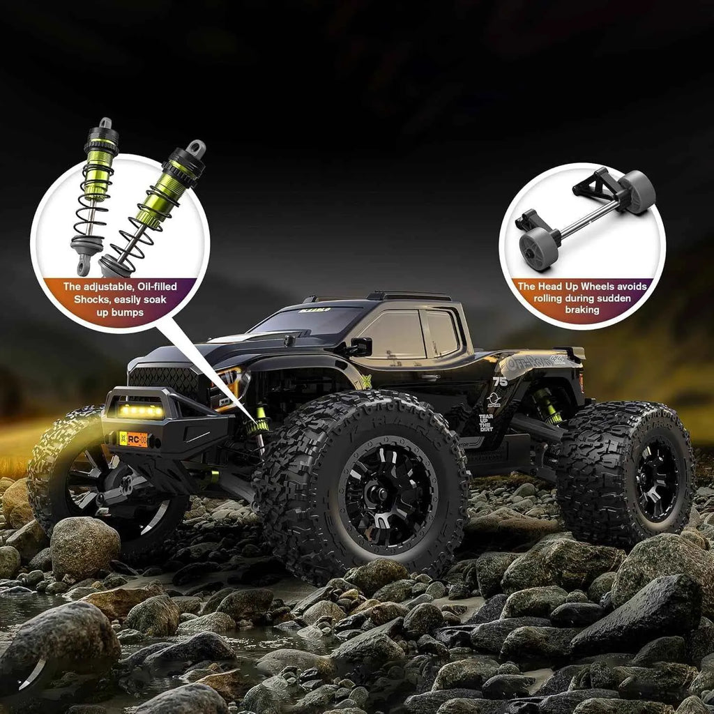 Off-road RC monster truck on rocky terrain with highlighted suspension and wheel components.