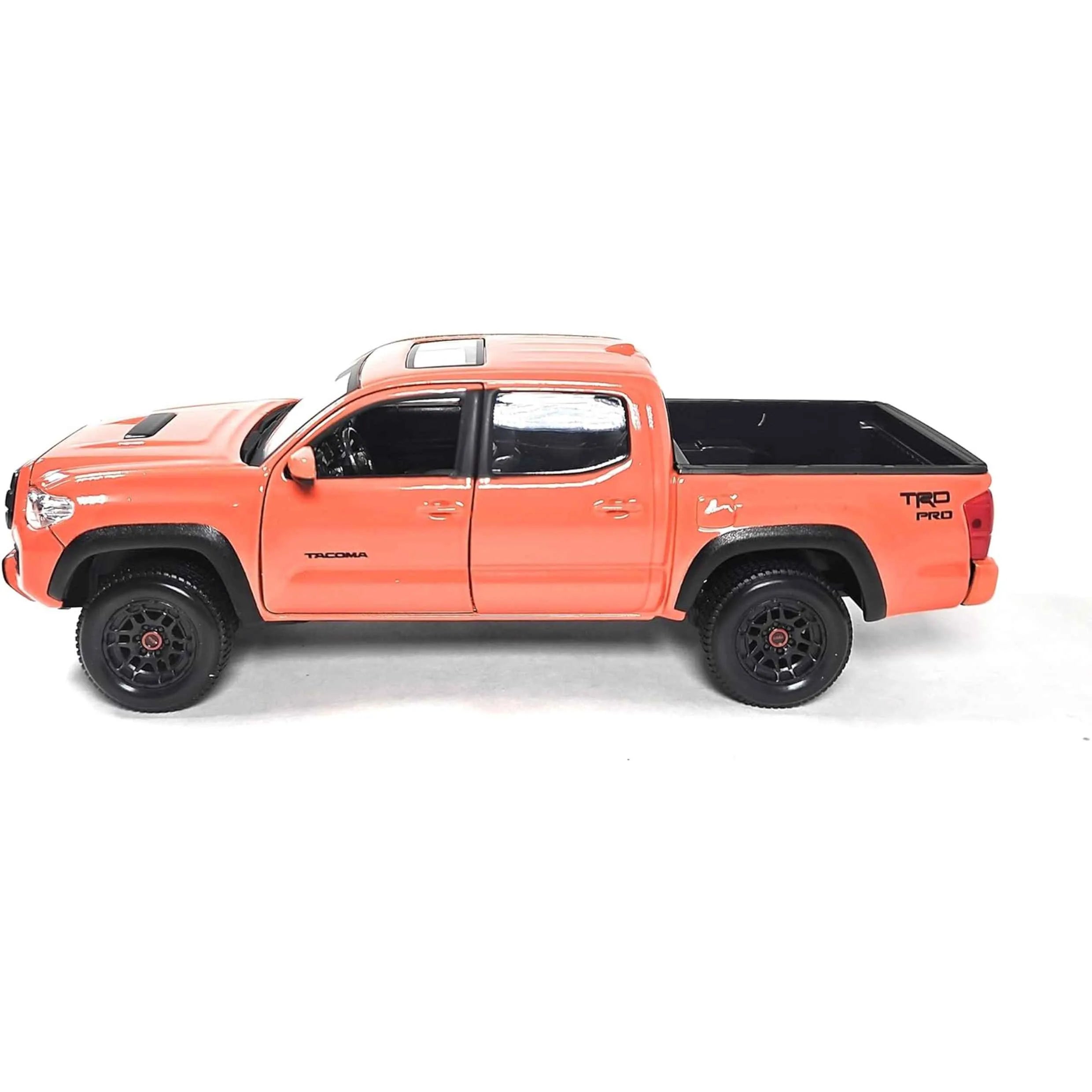 Orange model truck with black wheels on a white background