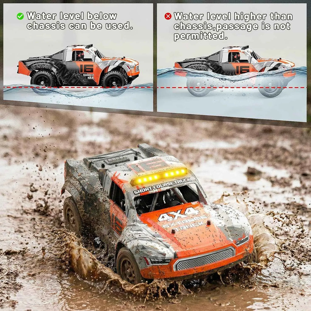 Orange remote control short course truck driving through water with guidelines on water level for safe operation.