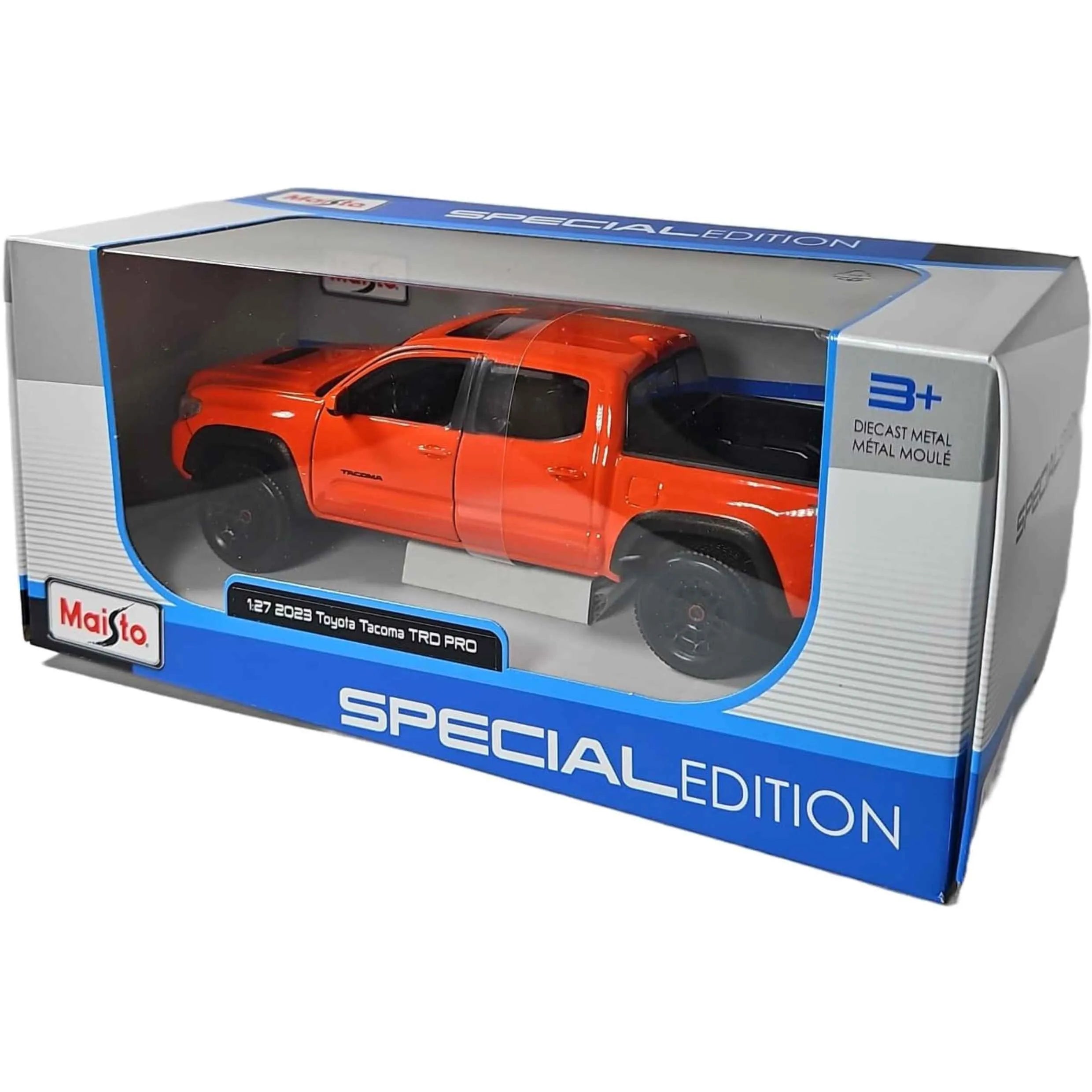 Orange toy truck in a 'Special Edition' Maisto packaging on a white background
