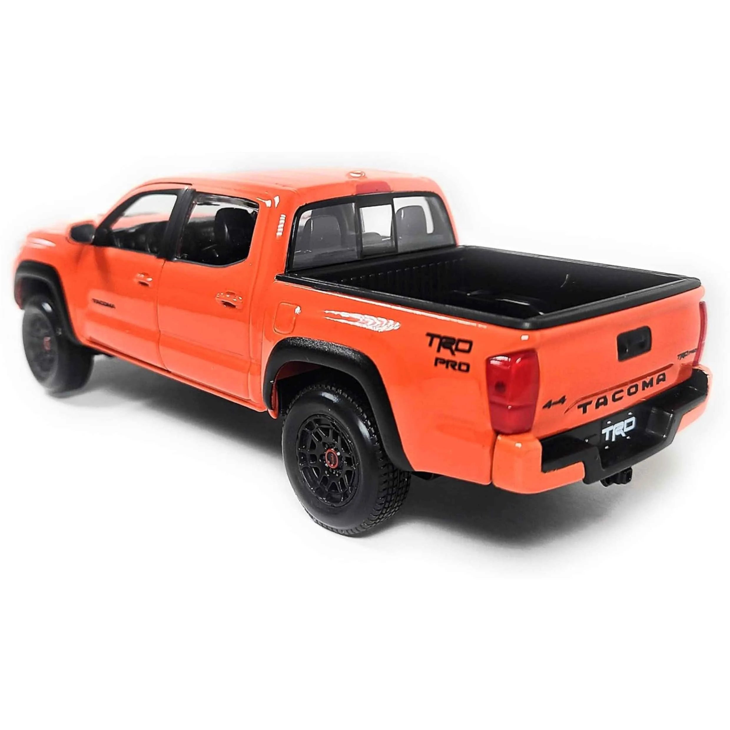 Orange Toyota Tacoma truck on a white background