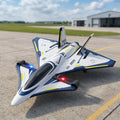 RC plane model of a futuristic jet on an airport tarmac with a building in the background