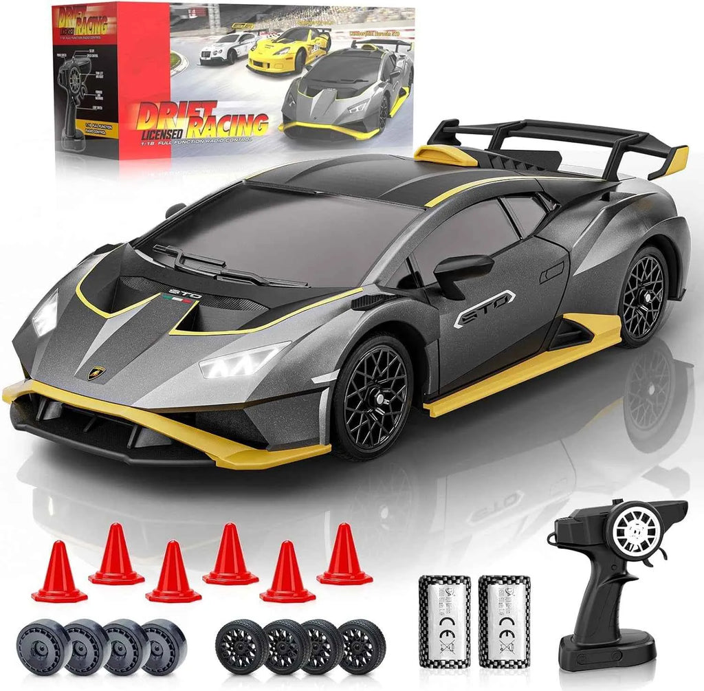 RC sports car with remote control and accessories on a reflective surface