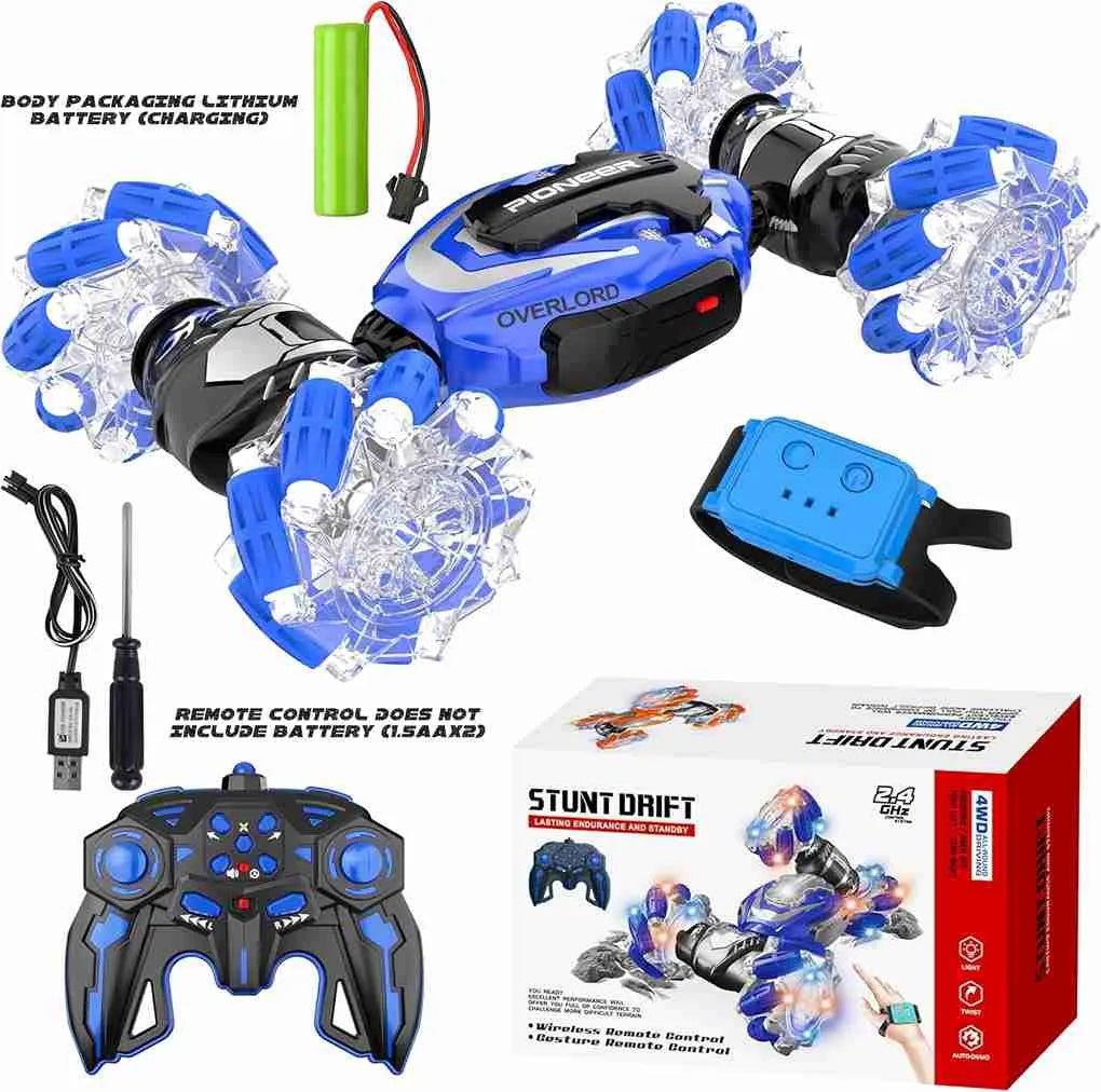 RC stunt car in blue with remote control and hand control device and other accessories. 