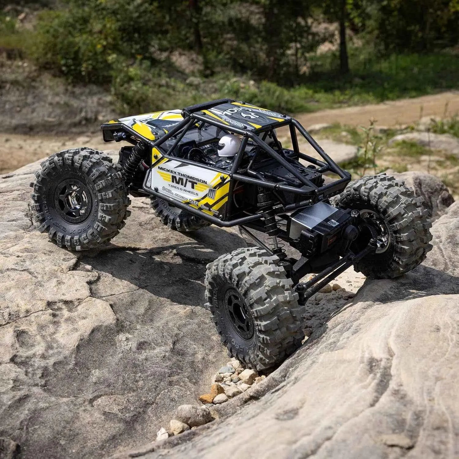 Model of a remote-controlled off-road crawler on rocky terrain