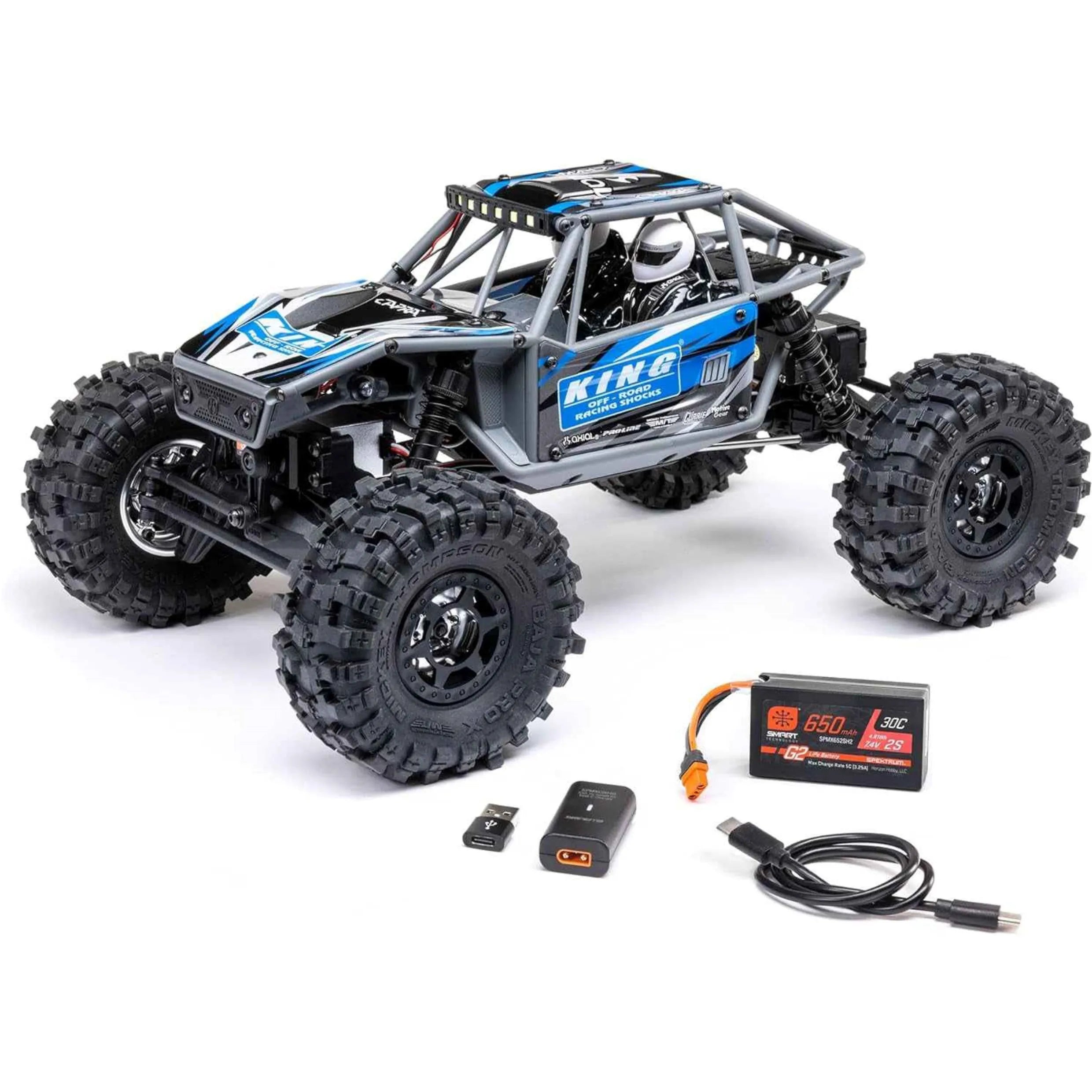 Remote control crawler with accessories on a white background