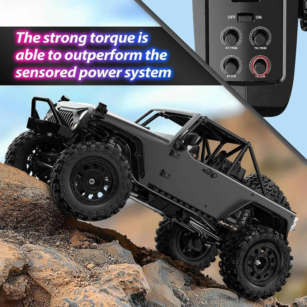 Remote control off-road crawler climbing a rocky terrain with controller above.