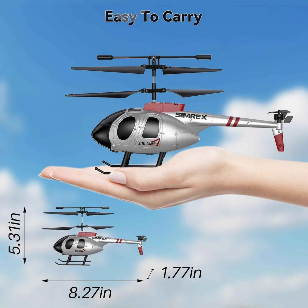 Simrex RC helicopter model held in a hand with measurements against a blue sky background