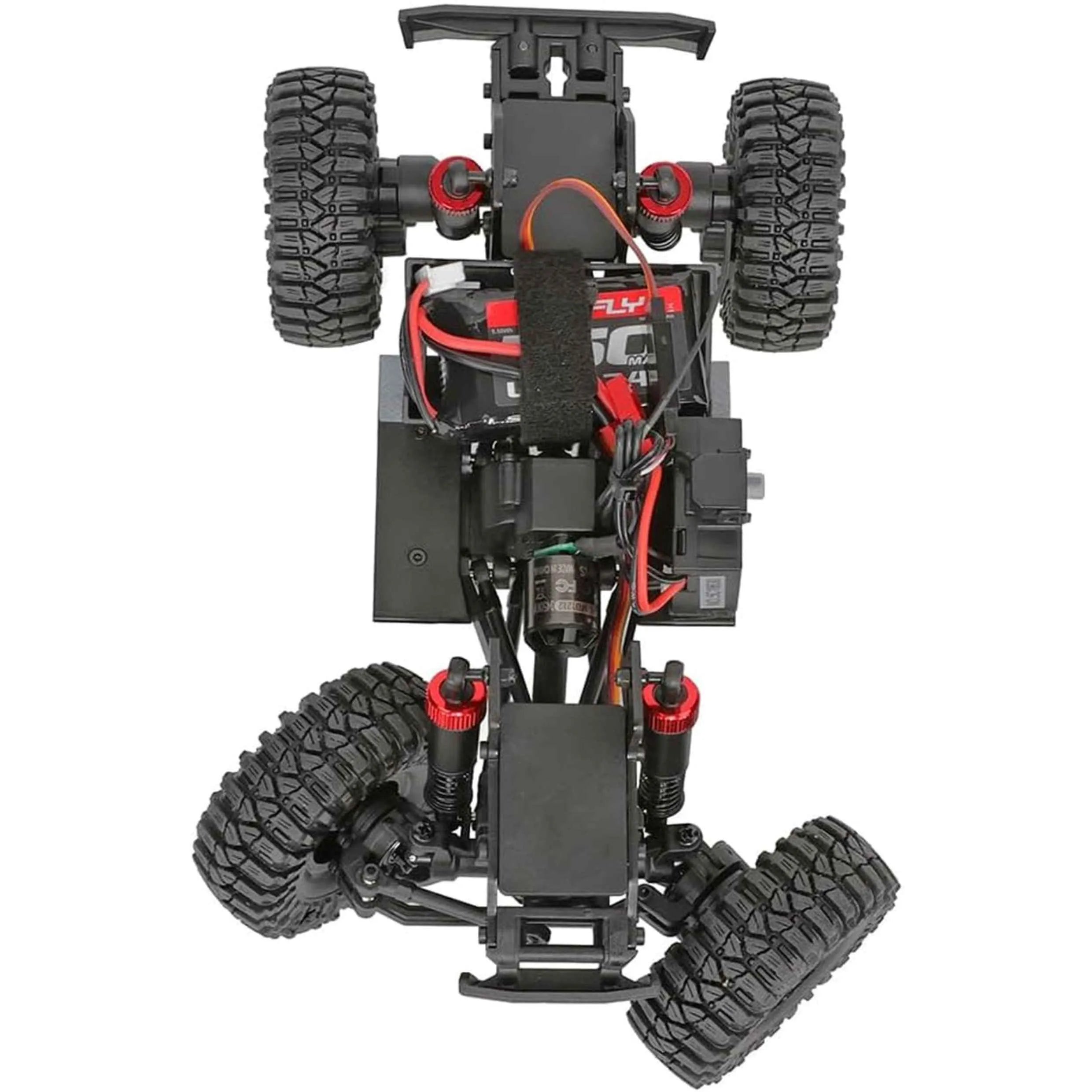 Top view of a remote control crawler chassis with large wheels on a white background