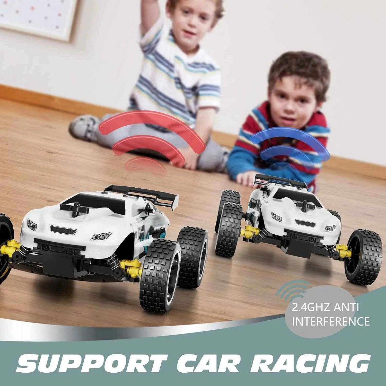 Two RC buggies on a table with children playing in the background, emphasizing 2.4GHz anti-interference feature.