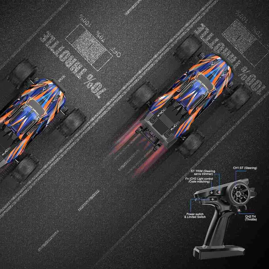 Two remote control monster truck on a track with a transmitter in the foreground.