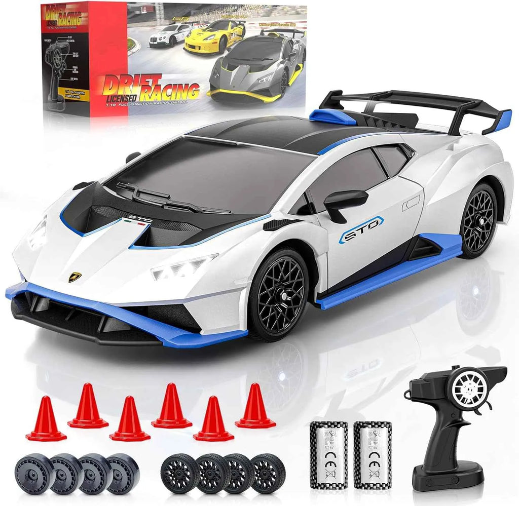 White and blue RC sports car with remote control and accessories on a white background