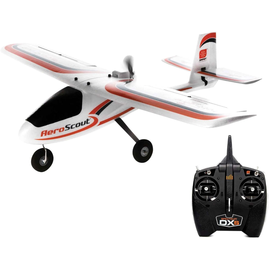White and orange remote control airplane with a black DX5 remote control on a white background