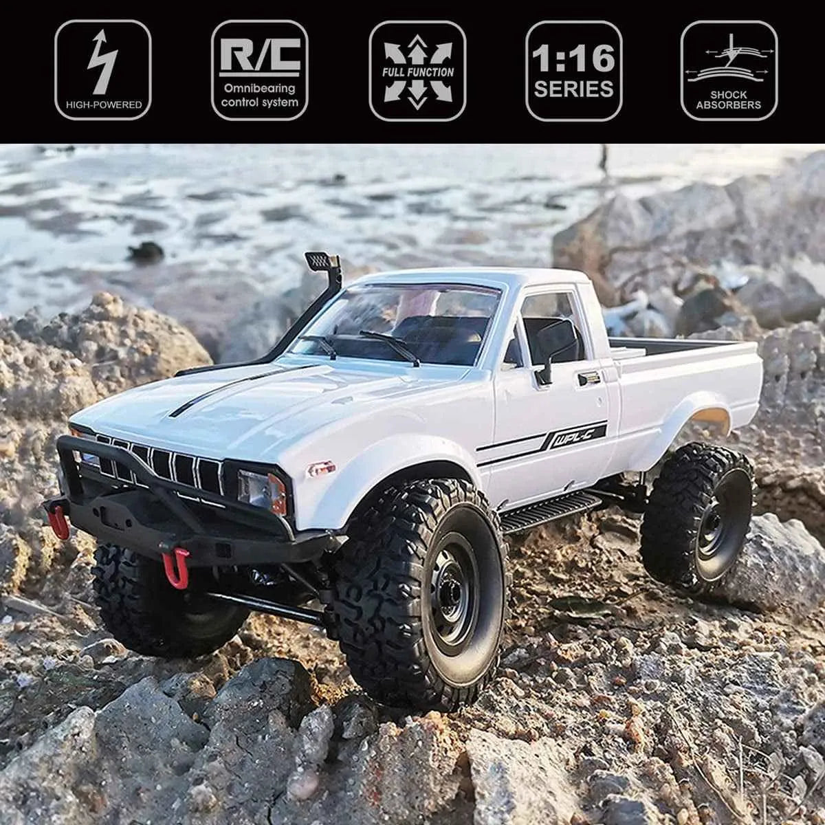 White off-road RC crawler on rocky terrain with feature icons at the top.